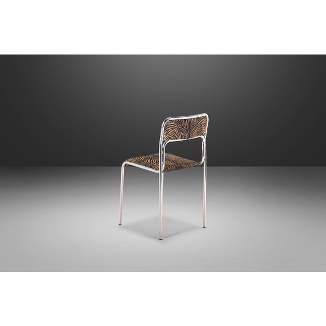 Attention designers! This ultra-stylish stacking accent chair is the epitome of functional art, featuring a newly...