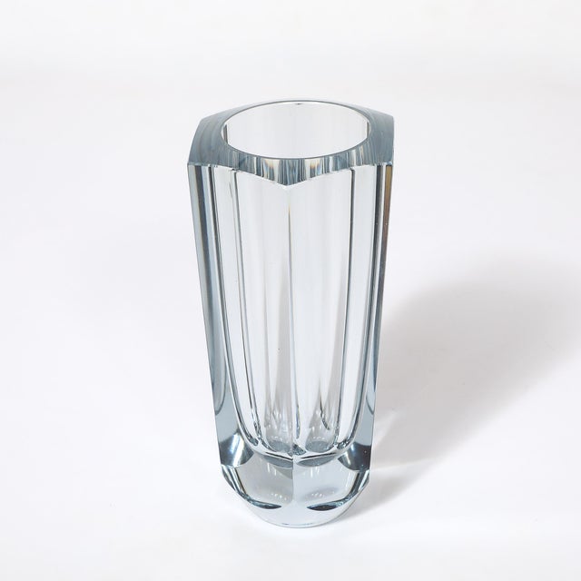 This sculptural Stromberg Swedish Mid-Century Faceted Crystal Vase originated in Sweden, circa 1950. The vase presents a...