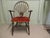 An Arts and Crafts Windsor Carver Chair This is a one off piece, the chair back has a large carved roundel and from this...