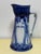 A striking example of Edwardian-era English ceramics, this antique Royal Doulton Burslem water pitcher is decorated in the...