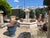 Metal Le Louvre Carved Limestone Center Fountain From the South of France For Sale - Image 7 of 16