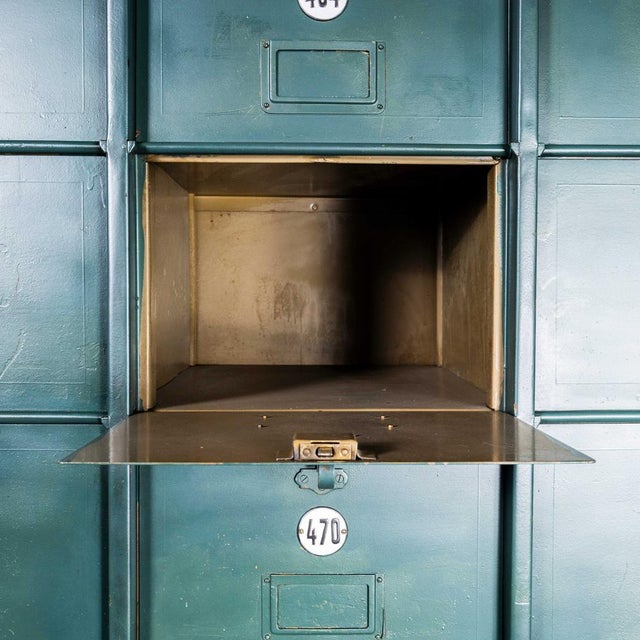1920's french industrial metal cabinet dark green - twenty seven klappets. Beautifully made very heavy weight sheet metal...