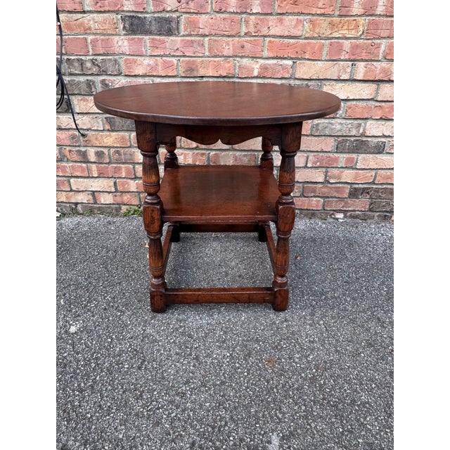 This is a lovely English oak tavern table, likely by Titchmarsh & Goodwin, featuring turned legs, great patina, and a...