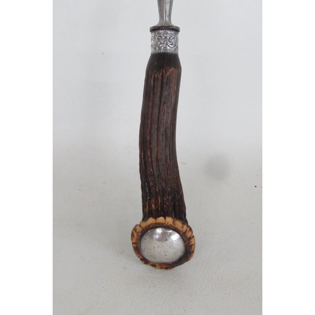 This gorgeous Knife Sharpener / honing Rod is made out of metal, sterling silver, and stag antler / horn. This stunning...