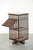 This unique antique English bookstand from the 19th century is made of oak and features a fold-down reading tray. The...