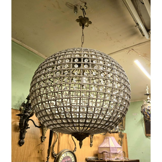 This one-of-a-kind chandelier blends grand sophistication with exquisite detail. Bold yet refined, it is designed to...