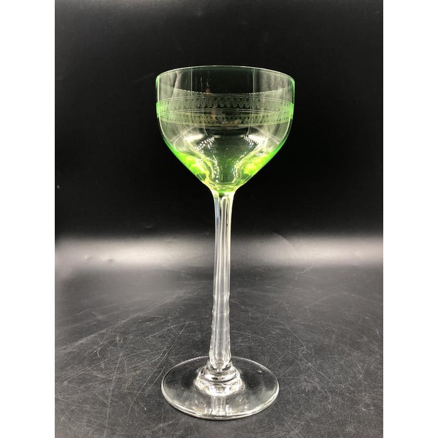 This exquisite set of five uranium glass wine glasses will add an extraordinary touch to your table arrangement. Each...