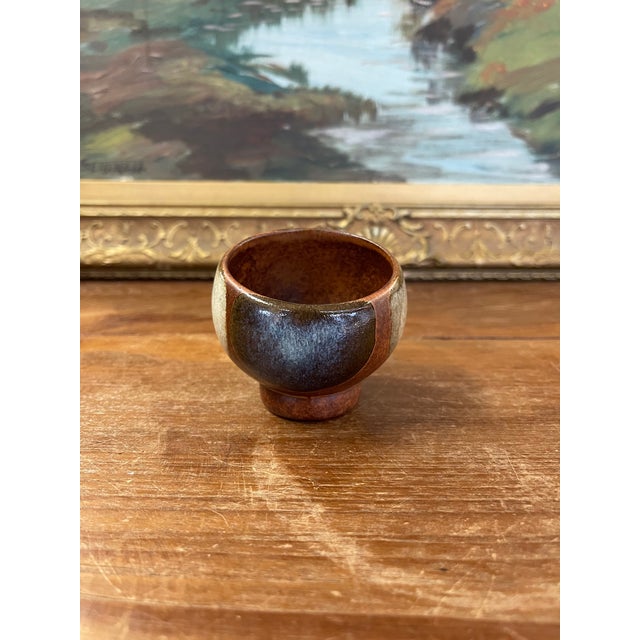 vintage mid-century modern studio pottery bowl featuring a beautifully hand-thrown form rich, organic glaze palette. The...