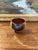 vintage mid-century modern studio pottery bowl featuring a beautifully hand-thrown form rich, organic glaze palette. The...