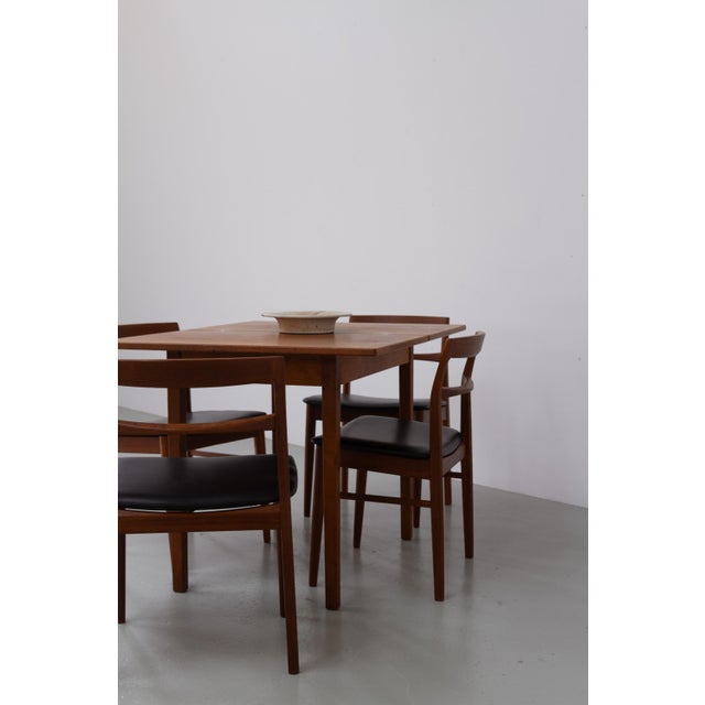 Vintage danish teak dining chairs by Kjærnulf for Vejle Møbelfabrik 1960s. Set of four dining chairs in teak designed by...