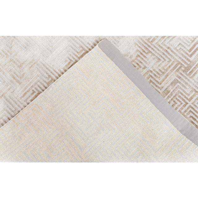 This Modern Maze Rug presents a sophisticated interplay of geometry, texture, and tone, embodying contemporary design...