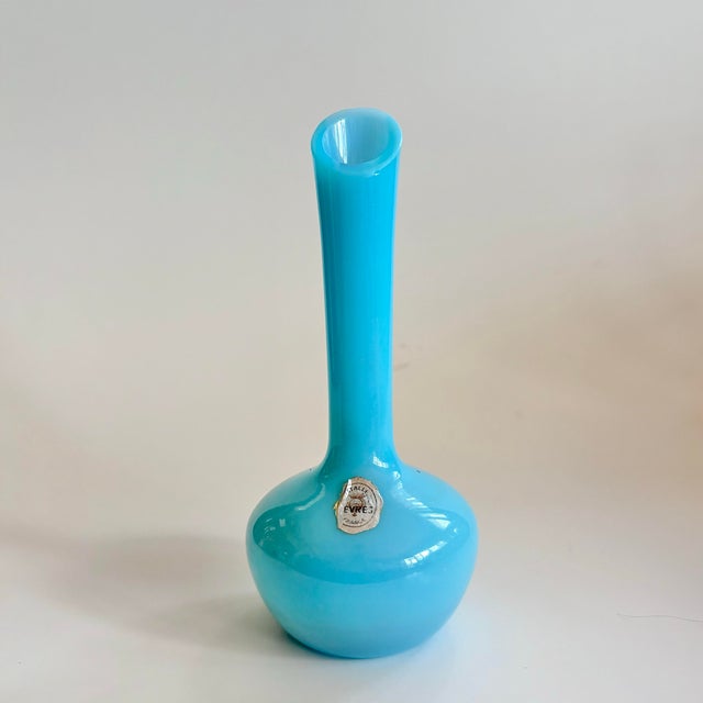 Vintage blue opaline glass bud vase by Sevres Cristallerie, retaining its original label. Features an elongated neck,...