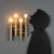 1970s wall lamp in brass-plated metal, featuring a geometric design reminiscent of the industrial style of the era. The...