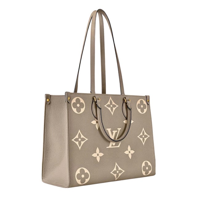 Louis Vuitton On The Go BICOLOR MM Monogram Empreinte Leather, Dove/Cream For Sale