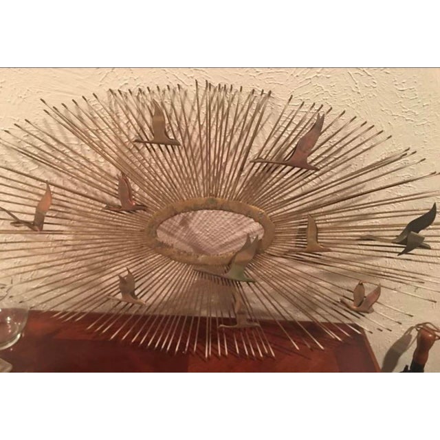Iconic mid century modern sunburst "Birds in Flight" wall sculpture attributed to William Friedle. Brutalist design made...