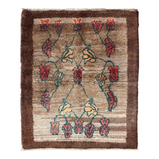 Vintage Tulu Rug With Camel Color Field and Flowers Surrounded by Brown Border For Sale