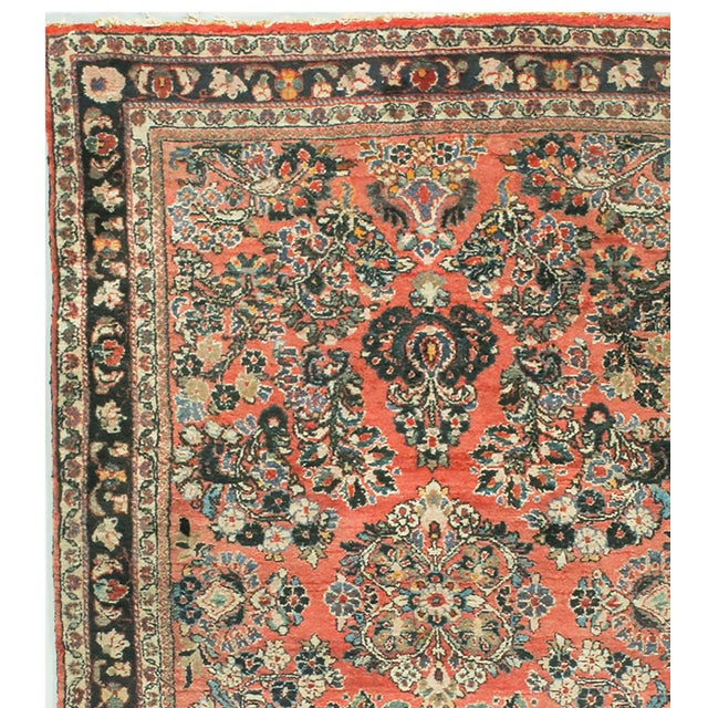 This piece features a central floral medallion, beautifully surrounded by intricate botanical motifs. It is framed by...