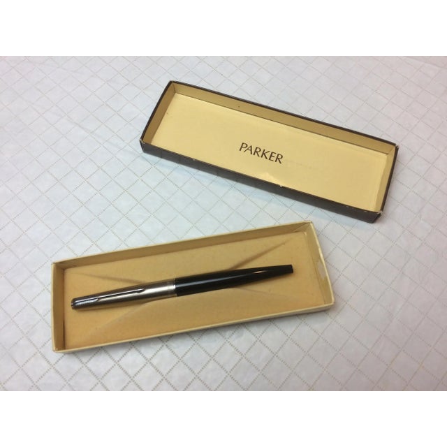 Elegant and stylish Parker brushed steel cap and black body fountain pen in original box This item has never been used...