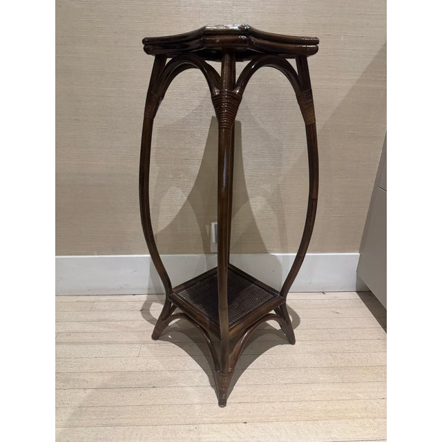 Vintage burnt bamboo and rattan pedestal plant stand or side table Mid-Century Modern two-tiered design with a square or...