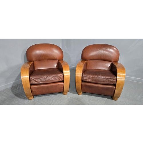 A superb pair of Art Deco style club armchairs, Birch arms and dark brown leather upholstery, very comfortable chairs with...