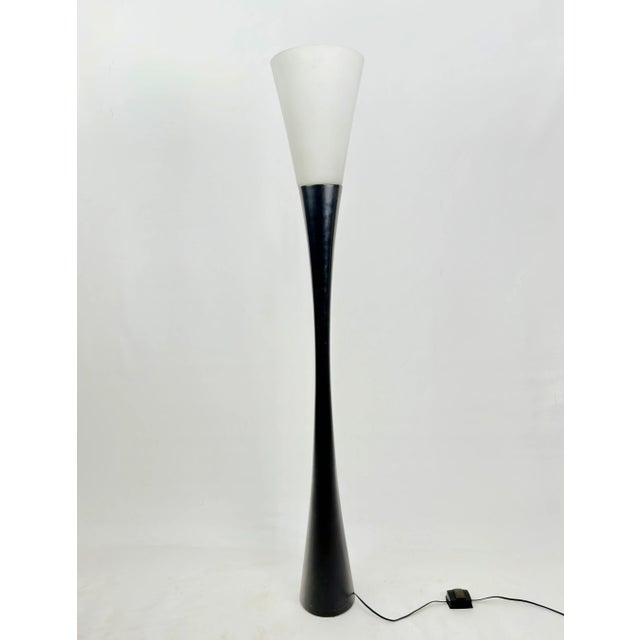 An early version of the French design icon "Diabolo" by Joseph-André Motte, still with a black lacquered wooden body and...