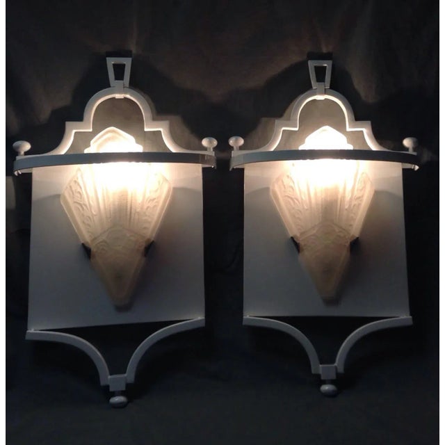 Two wall sconces by Fine Art Lamps Miami Lakes Fl from their Portobello Road Collection. White lacquer finish on metal....