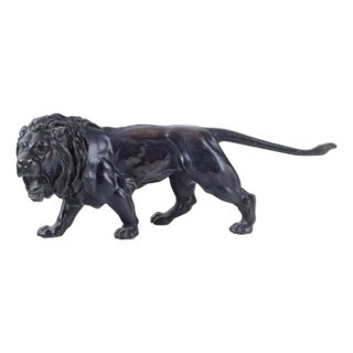 Early 20th Century Black Patinated Metal Roaring Male Lion Sculpture For Sale