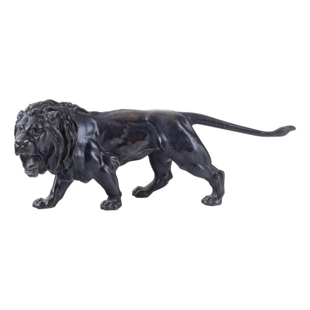 Early 20th Century Black Patinated Metal Roaring Male Lion Sculpture For Sale