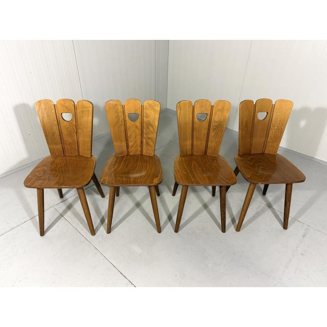 Set of 4 brutalist farmhouse dining chairs. Wooden frame with nice back rest, thick molded multiplex seat. 1950’s. In good...