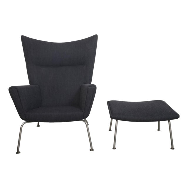 Set of Wingchair with Ottoman in Grey Fabric by Hans Wegner, 2019 For Sale