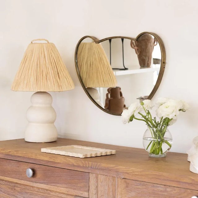 Beautiful vintage heart shaped brass mirror from Italy, 1950's. Unique shape with nice age and patina to brass.