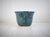 Charming handmade studio pottery sculpted face planter with a pinched, ruffled rim. This piece was acquired from a notable...
