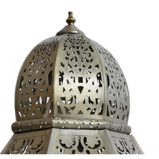 Beautiful large moorish style tin table or floor lantern. Attractive romantic perforated cut out design patterns. Each may...