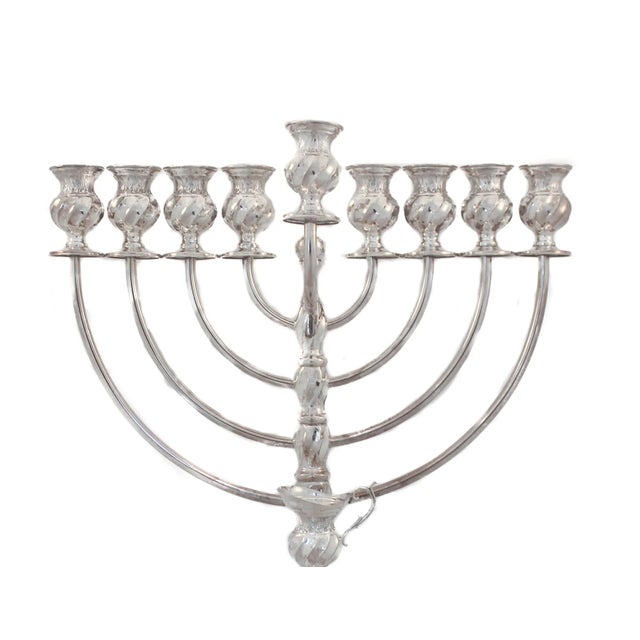 We are delighted to offer you this sterling silver modern menorah. With Hanukkah just a few weeks away, now is the time to...