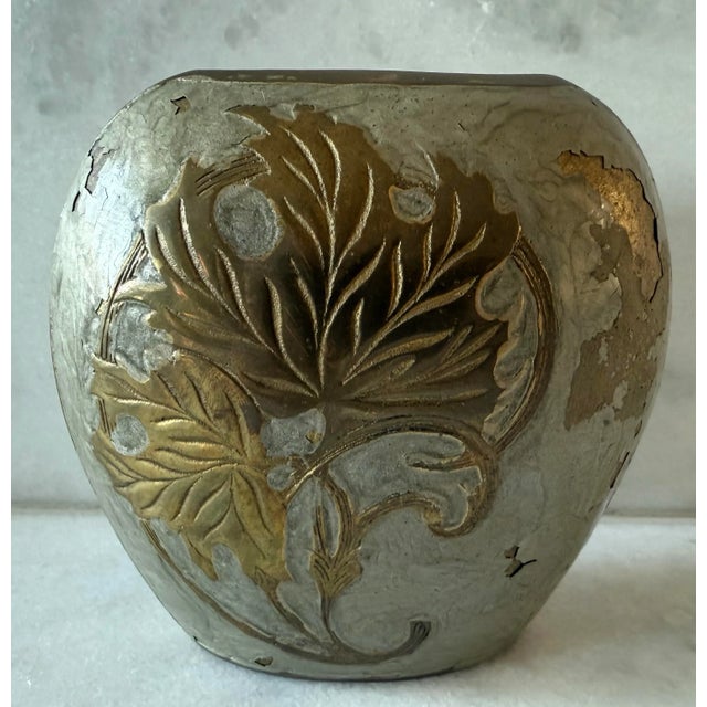 Vintage solid brass enameled bud vase or vessel with a gold leaf design. Top opening is about 2.5" x .75"