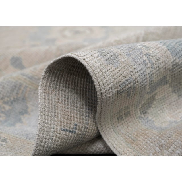 Turkish Oushak Rug Soft Gray and Blue Tones Handwoven Wool Rug 5' X 7'1" This 5' x 7'1" Turkish Oushak rug presents a...