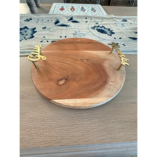 Pretty tray made of Acacia wood with brass tone handles. The handles say “Give Thanks”. Would make a lovely tray for...