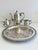 This elegant vintage silverplate tea/coffee service features 1 tea/coffee pot by Wm. Rogers & Son, paired with a...