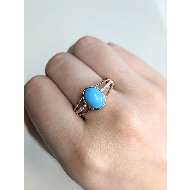 A dreamy 1.8 carat Arizona Sleeping Beauty turquoise rests in a smooth bezel setting, radiating sky-blue charm. The oval...