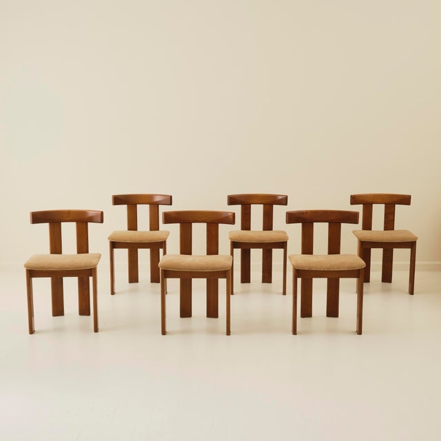 Set of six chairs from Luigi Vaghi's Euro series, produced by Former. Made in stained walnut with newly upholstered seats...