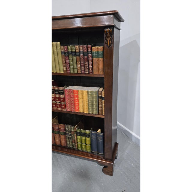 A very good Victorian mahogany open adjustable library bookcase, standing on bracket feet, two mahogany fronted shelves,...