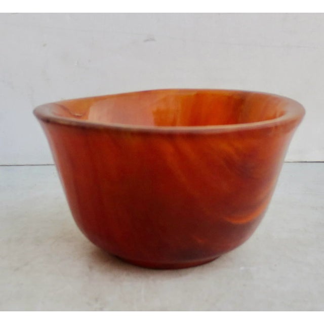 Chinese ox horn cup. Steamed and turned ox horn with strong amber color and wavey pattern of annual growth. The material...