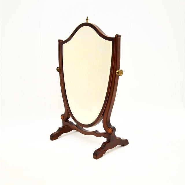 A fantastic antique Georgian table top mirror. This was made in England, it dates from around the 1800-1810 period. The...