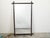 A French rectangular faux-bamboo mirror from the early 20th century, with black patina. Created in France during the Turn...