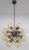Italian sputnik chandelier with 24 amber Murano glass globes carefully hand blown with bubbles inside the glass using...