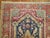 A vintage Turkish Kula Carpet. Predominant accents in blue, red, purple and green.