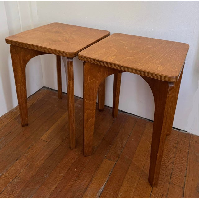 Pair of square mid century plywood constructivist side tables with arched legs. Made in Russia