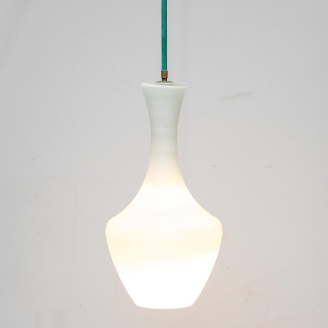 White opaline glass chandelier. Item made around the 1970s. Good condition with normal signs of aging, as shown in photos....