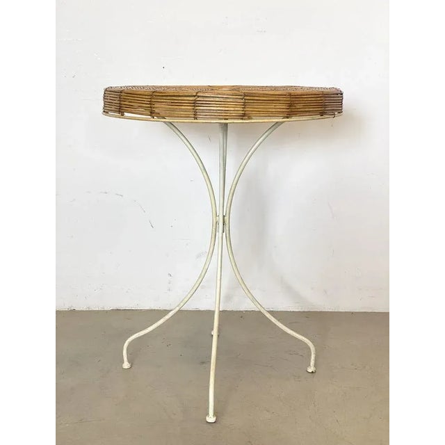 Wrutht Iron Table and Pump in the Rush, Three tables