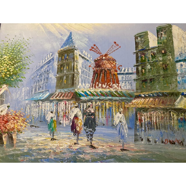 Vintage oil on canvas painting by Caroline Burnett, (1877-1950), features a Parisian street scene centered on the iconic...
